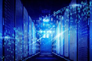 Blue-toned data center aisle with server racks and glowing binary code overlay, representing data flow and AI workloads.